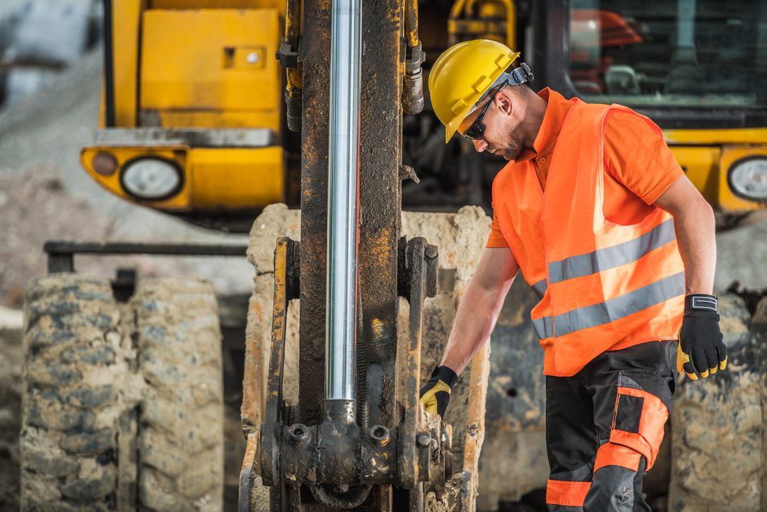 Man at Excavating Site